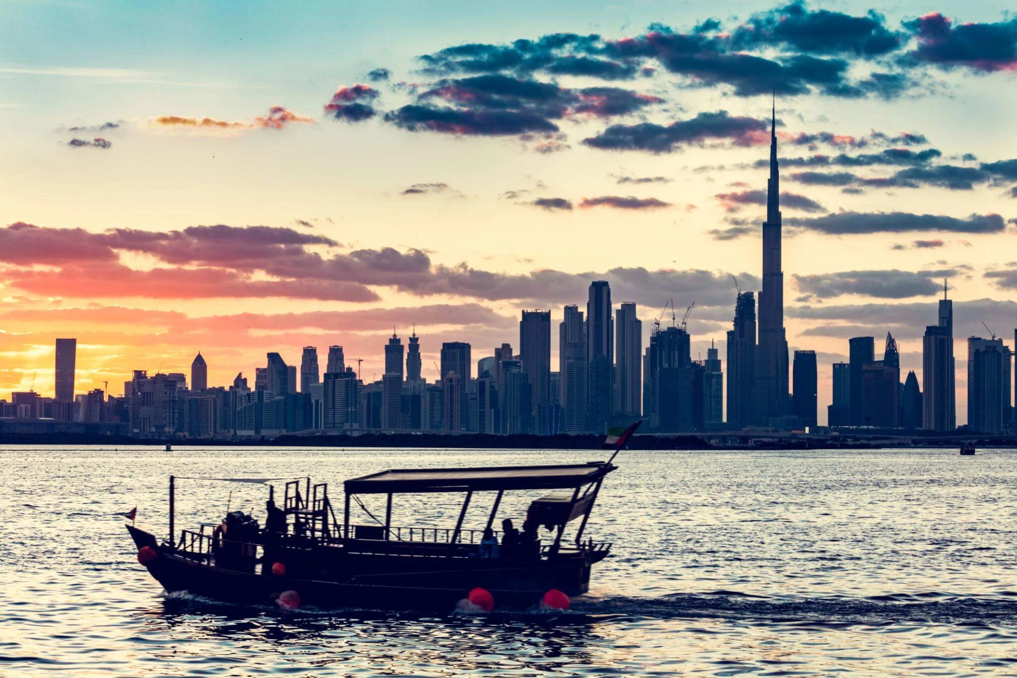 Skyscrapers skyline of Dubai UAE downtown with Burj Khalifa at sunset